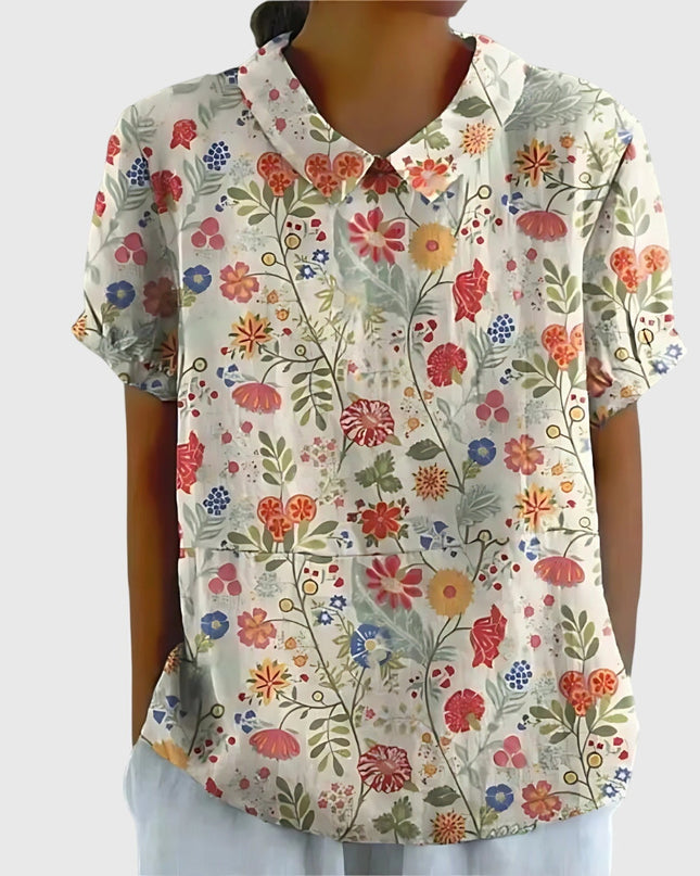 Bluzka w kwiaty dla kobiet o luźnym kroju i z lekkiego materiału – letnia, swobodna bluzka w dużych rozmiarach 11