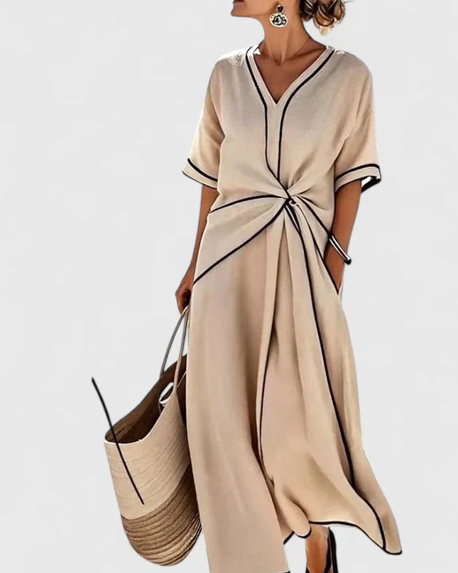 Elegancka letnia sukienka w pionowe paski – lekka i przewiewna 1