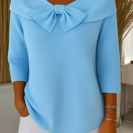 Elegancki sweter z kokardką i dopasowanym krojem – minimalistyczny styl na każdą okazję 0