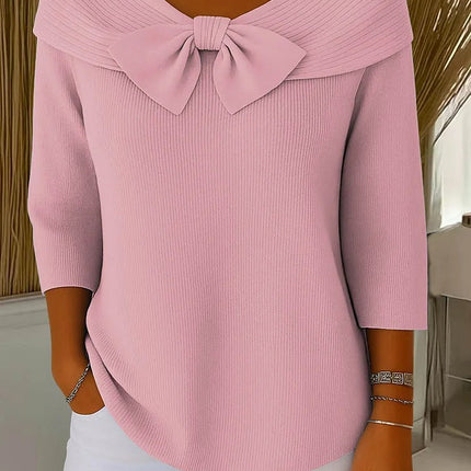 Elegancki sweter z kokardką i dopasowanym krojem – minimalistyczny styl na każdą okazję 1