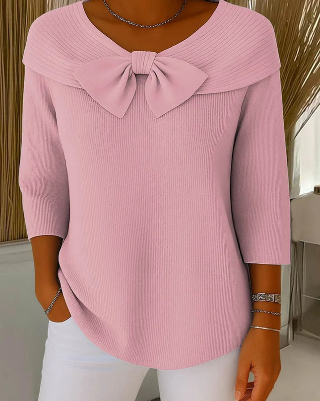 Elegancki sweter z kokardką i dopasowanym krojem – minimalistyczny styl na każdą okazję 1