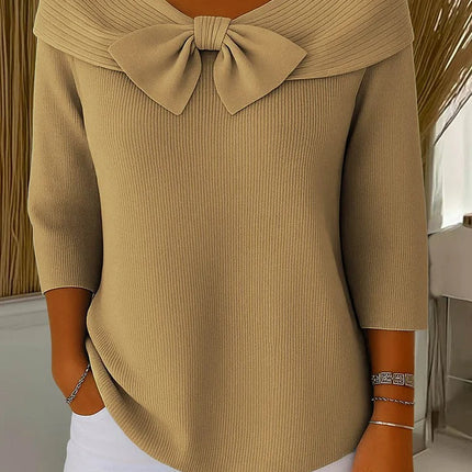 Elegancki sweter z kokardką i dopasowanym krojem – minimalistyczny styl na każdą okazję 2