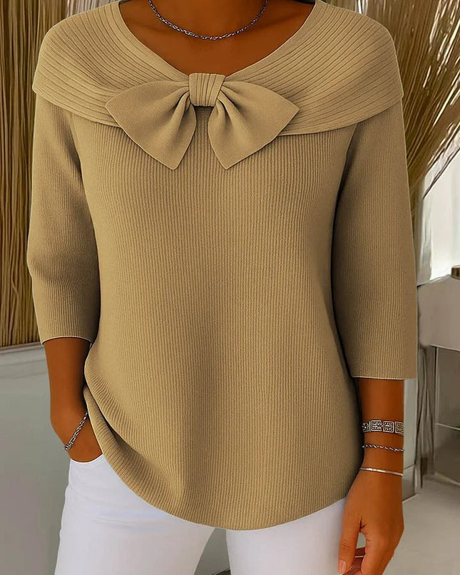 Elegancki sweter z kokardką i dopasowanym krojem – minimalistyczny styl na każdą okazję 2