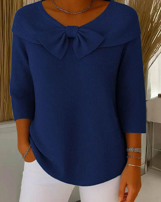 Elegancki sweter z kokardką i dopasowanym krojem – minimalistyczny styl na każdą okazję 4