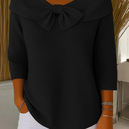 Elegancki sweter z kokardką i dopasowanym krojem – minimalistyczny styl na każdą okazję 5