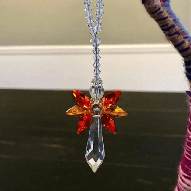 Figurka anioła z magicznym łapaczem promieni słonecznych 11