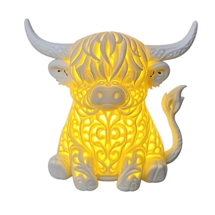 Lampa stołowa LED z ażurowym wzorem, zasilana przez USB, emitująca ciepłe bursztynow 1
