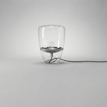 Lampa stołowa LED z szklanym kloszem w skandynawskim designie, emitująca miękkie światło 0