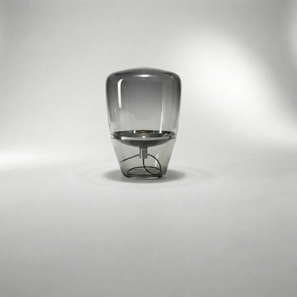 Lampa stołowa LED z szklanym kloszem w skandynawskim designie, emitująca miękkie światło 4