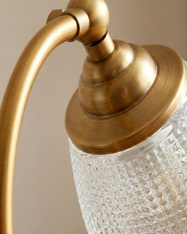 Lampa stołowa vintage z zakrzywionym designem i metalicznym wykończeniem w kolorze złota, ideal 2