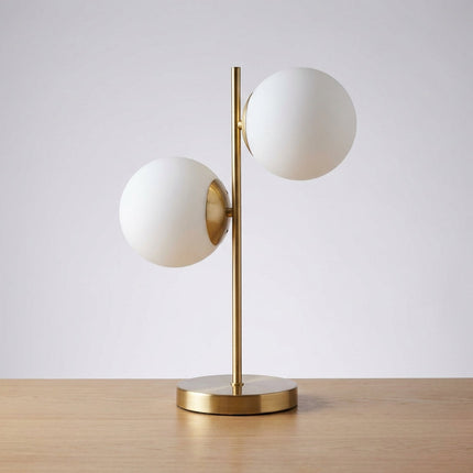 Lampa stołowa z matowego szkła, wyposażona w dwie żarówki, idealna do wnętrz w stylu sk 1