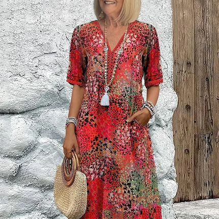 Letnia sukienka do kolan z dekoltem w serek, kwiatowym wzorem i kieszeniami bocznymi – wygodne sukienki w dużych rozmiarach dla kobiet 0