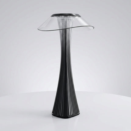 Nowoczesna lampa akcentująca z rzeźbiarskim designem, oferująca ciepłe światło idealne do 0