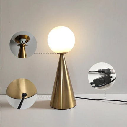 Nowoczesna lampa stołowa z matowego szkła i złotym wykończeniem, o rzeźbiarskim design 4