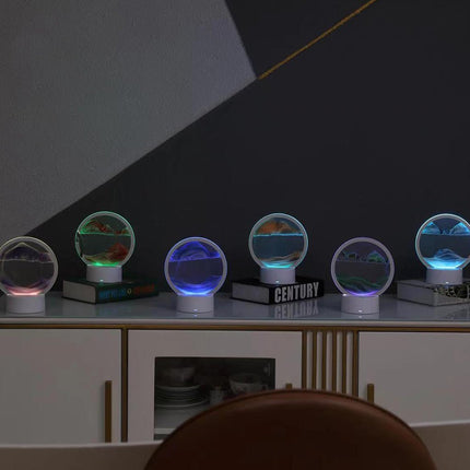 Okrągła lampa artystyczna z LED, prezentująca zmienne wzory piasku, idealna do nowoczesnych 4