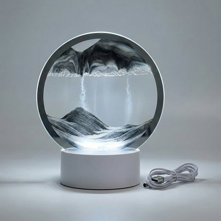 Okrągła lampa artystyczna z LED, prezentująca zmienne wzory piasku, idealna do nowoczesnych 6