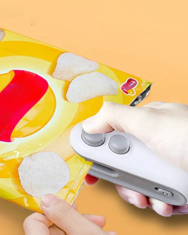 Przenośna mini zgrzewarka i obcinacz torebek do świeżej żywności – kompaktowa i lekka 2