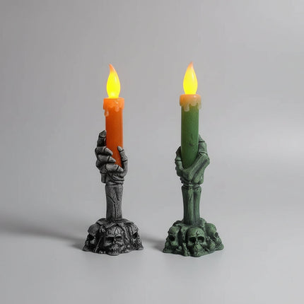 Świeca LED na Halloween z motywem szkielety, w kolorach pomarańczowym i zielonym, o wysokości  4