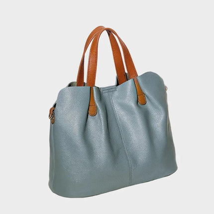 Torebka damska ze skóry naturalnej, elegancki design, regulowany pasek, pojemna, idealna na cod 7