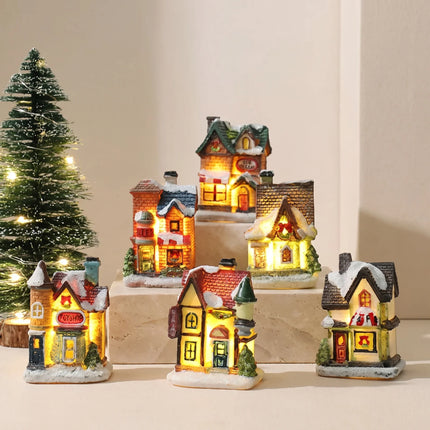 Zestaw dekoracji świątecznych z oświetleniem LED, zawierający 6 miniaturowych domków z ośnie 0