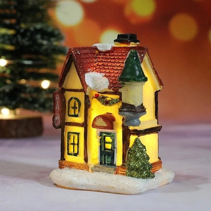 Zestaw dekoracji świątecznych z oświetleniem LED, zawierający 6 miniaturowych domków z ośnie 3