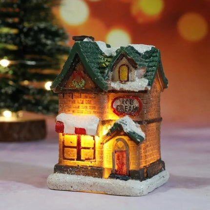 Zestaw dekoracji świątecznych z oświetleniem LED, zawierający 6 miniaturowych domków z ośnie 4